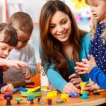 children study with a teacher